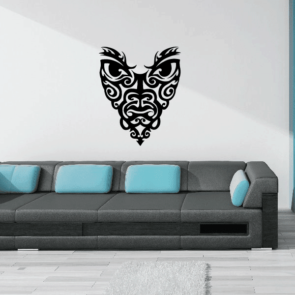 Tribal mask decal with ornate swirls and symmetrical wings, black