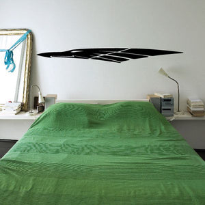 Tribal vehicle pinstripe vinyl decal, black stylized stripe design on wall