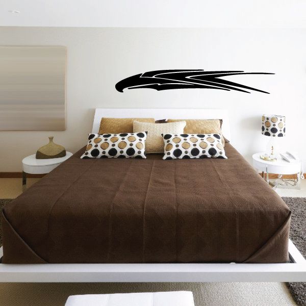 Tribal vehicle pinstripe vinyl decal, black tribal stripe design on a wall