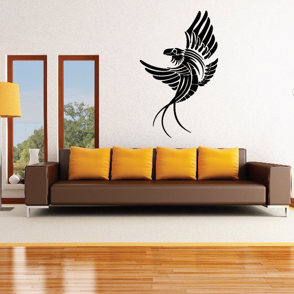 Tribal pinstripe vinyl decal of a black bird with spread wings and feathered tail.