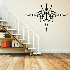 Tribal wall decal with black flame emblem, arrow tip, and curved pinstripe swirls