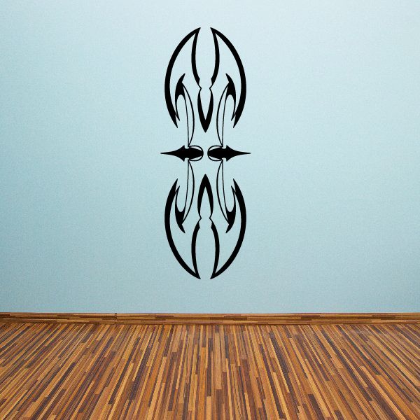 Tribal vehicle pinstripe wall decal: black flame-shaped emblem with mirrored design
