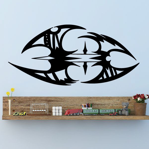 Black tribal vehicle pinstripe wall decal with angular emblem and compass-style center