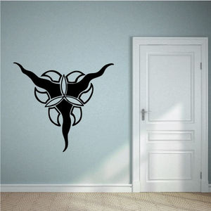 Black tribal vehicle pinstripe wall decal with curvy emblem and scroll accents
