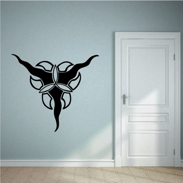 Black tribal vehicle pinstripe wall decal with curvy emblem and scroll accents