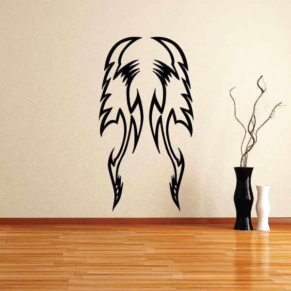Black tribal animal head wall decal with stylized wings and feathers