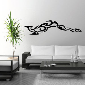 Tribal vehicle pinstripe wall decal, black decorative outline on wall.