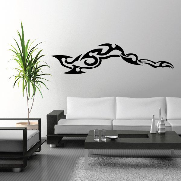 Tribal vehicle pinstripe wall decal, black decorative outline on wall.