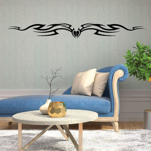 Tribal vehicle pinstripe wall decal with black winged design and center emblem