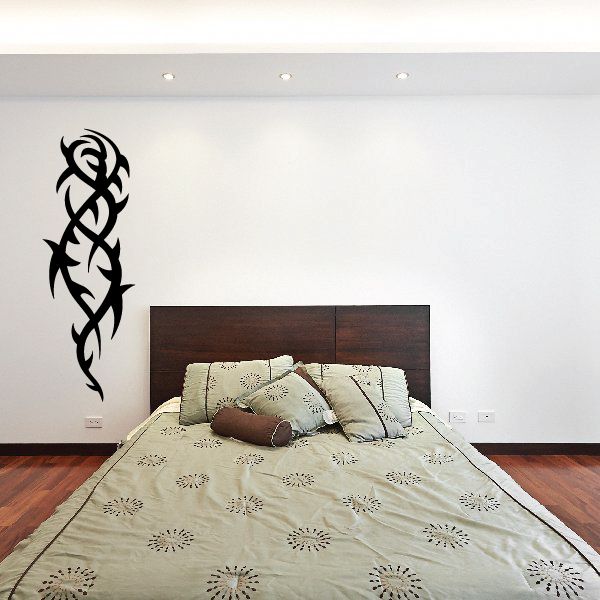 Black tribal vine wall vinyl decal with looping knot pattern