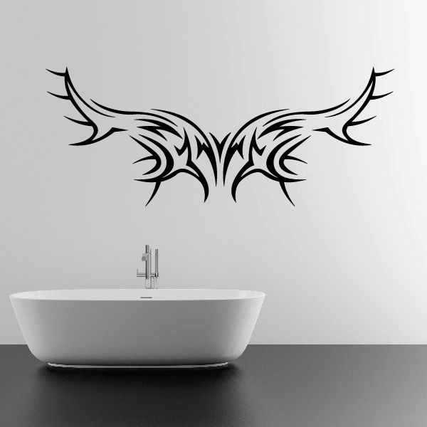 Tribal vinyl wall decal, black symmetrical wing design with sharp tribal lines.