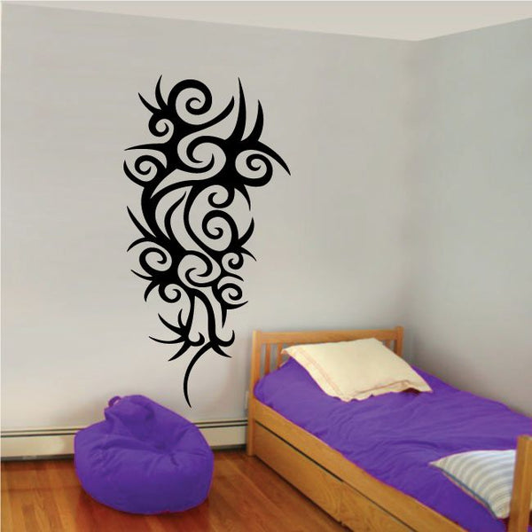 Black tribal wall decal with ornate vertical design and swirling shapes