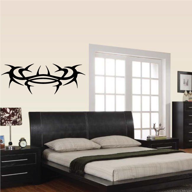 Tribal crab-style wall decal in black, curved spines and shell