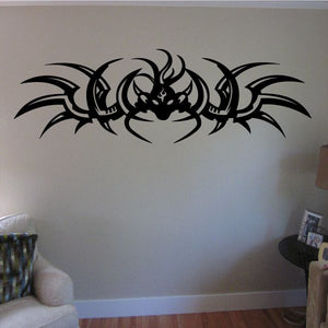 Tribal vinyl wall decal with black dragon emblem and curved tribal wings