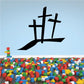 Black triple cross decal with three overlapping vertical crosses
