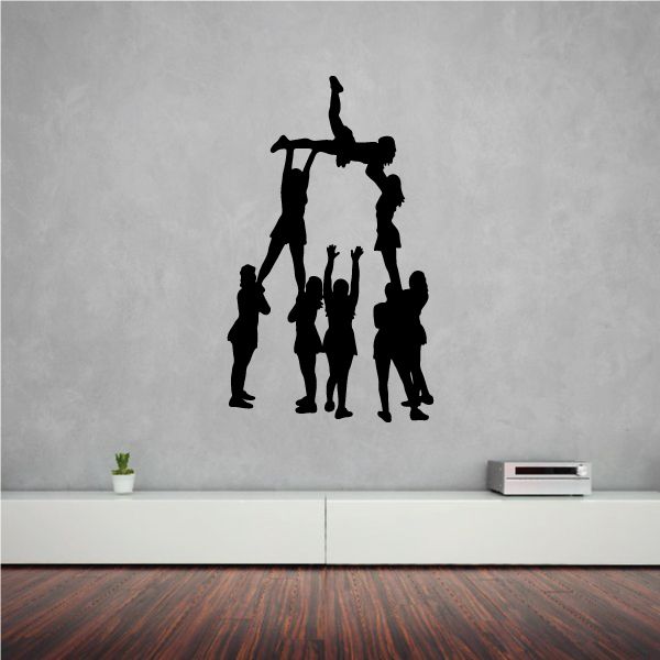 Cheerleading tower decal with stacked cheerleader silhouettes, black.