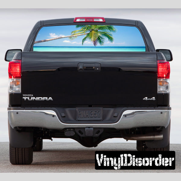 Pickup truck with tropical rear window graphic