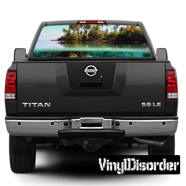 Vehicle rear window graphic with tropical landscape view, on pickup truck tailgate