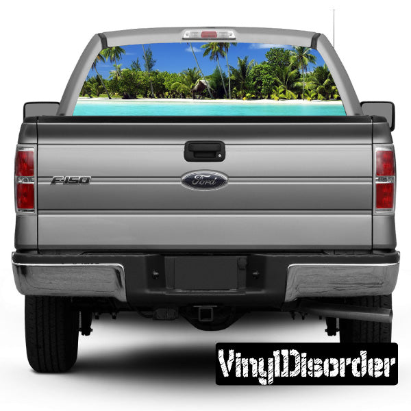 Pickup truck rear window tropical graphic decal with blue sky and palm trees
