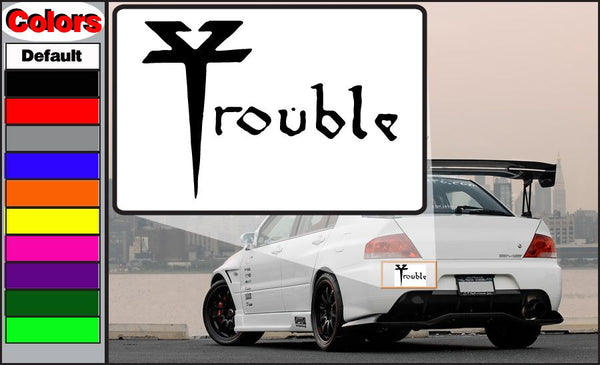 Car decal with black Trouble lettering and trident-style logo
