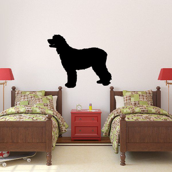 Tucker dog decal featuring a black standing dog silhouette on a wall
