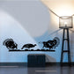 Turkeys grazing wall decal with three animal silhouettes in black