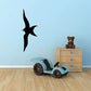 Flying shore bird wall decal, black turning silhouette