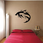 Hourglass dolphin wall decal, black dolphin silhouette with hourglass shape inside.
