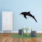 Black dolphin leaping wall decal silhouette with flowing tail