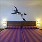 Flying egret wall decal with swirling tail, black and white bird sticker