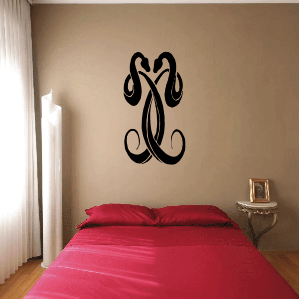 Image of Two Interlocking Snakes Decal