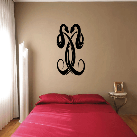 Image of Two Interlocking Snakes Decal