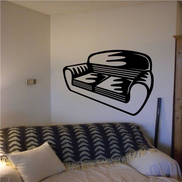 Two-person sofa wall decal in black outline with stylized cushion details.