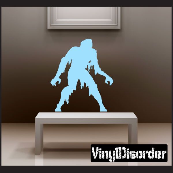 Blue zombie decal with raised hands, crawling up from the ground
