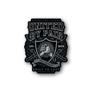 Vinyl sticker with United by Pain emblem, raised fist, laurel wreath, banner