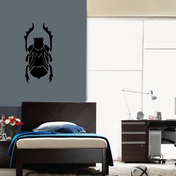 Black beetle wall decal with upward arms silhouette
