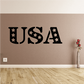 Wall decal reading USA with stars, black lettering