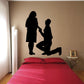Black silhouette lover proposal wall decal, kneeling partner and standing partner holding hands