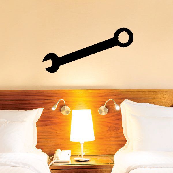 Combination wrench wall decal, black metal wrench icon