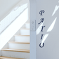 Vertical text decal with dark blue 'PATIO' letters