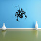 Ladybug wall decal with dark body and blue spot pattern