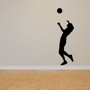 Volleyball wall decal featuring a black player silhouette and volleyball ball icon