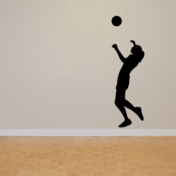 Volleyball wall decal featuring a black player silhouette and volleyball ball icon