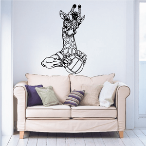 Volleyball wall decal vinyl: black and white giraffe holding a volleyball outline