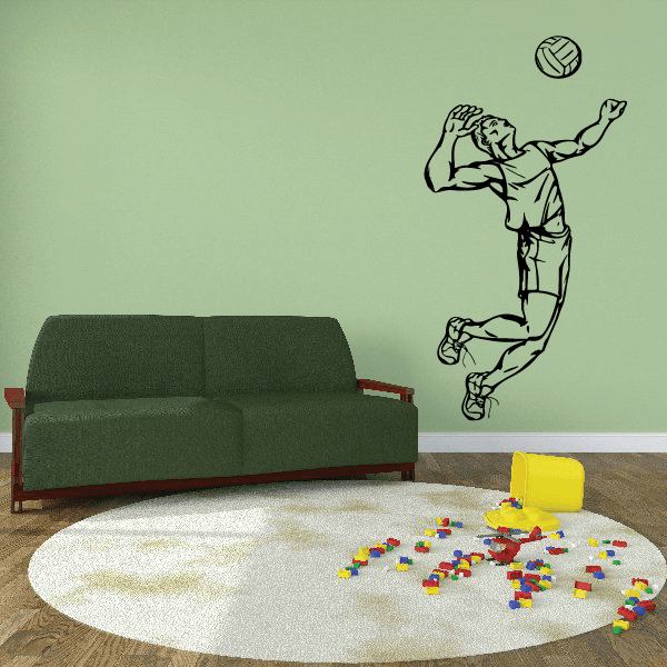 Volleyball player wall decal: athlete catching a volleyball overhead, outlined vinyl