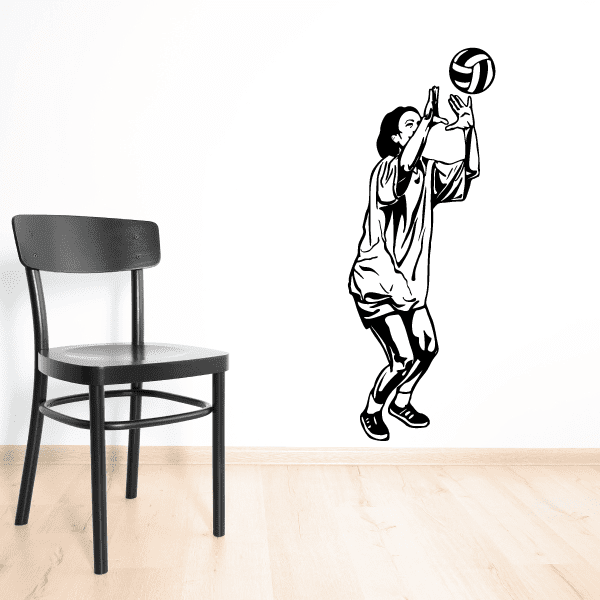 Volleyball wall decal of two players reaching for a volleyball