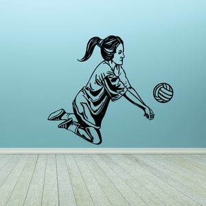 Volleyball wall decal of a kneeling player holding a volleyball