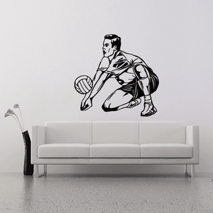 Volleyball wall decal vinyl of a kneeling player holding a volleyball, black outline