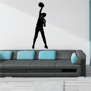 Volleyball wall decal: black player silhouette holding a volleyball