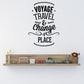 Decorative wall decal with bold text: VOYAGE, TRAVEL & Change of PLACE, with swirls